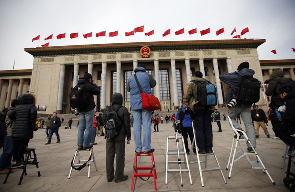 Journalists waiting outside the Great Hall of the People during the Chinese People's Political Consultative Conference in Beijing in March.Credit Kim Kyung-Hoon/Reuters