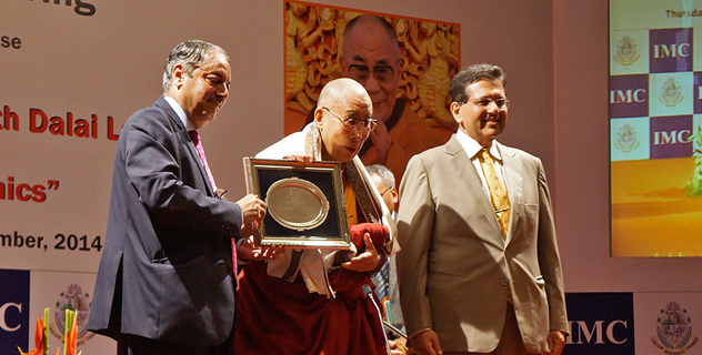 His Holiness the Dalai Lama is presented with mementos at the 108th Foundation Day of the Indian Merchants' Chamber (IMC) and the Ladies' Wing of the IMC in Mumbai, India on September 18, 2014. Photo/Jeremy Russell/OHHDL