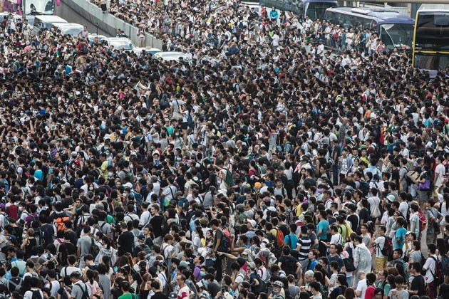 Demonstrators gather near central government offices during a protest in Hong Kong on Sept. 28, 2014/Bloomberg