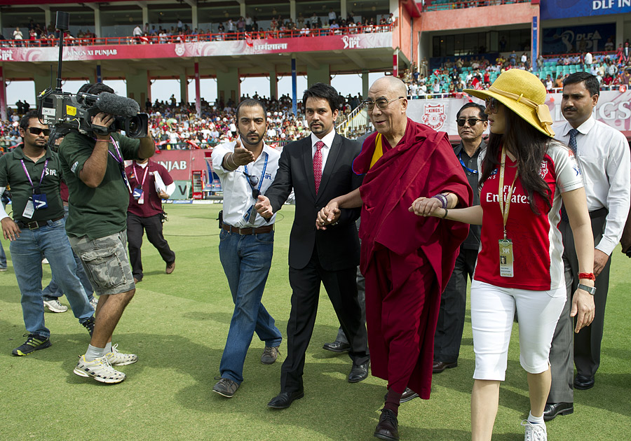 His Holiness the Dalai Lama watching the IPL cricket match in Dharamsala, India, on May 21, 2011. Photo/Tenzin Choejor/OHHDL