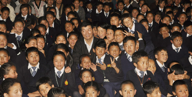 Sikyong with children after a public talk at CST school in Sonada in West Bengal, India, on 6 Oct 2014/Photo by Namgyal Tsewang