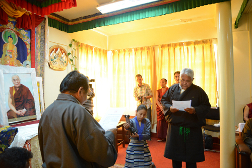 Mr. Ngodup Wangdue taking oath from the Chief Justice Commissioner.