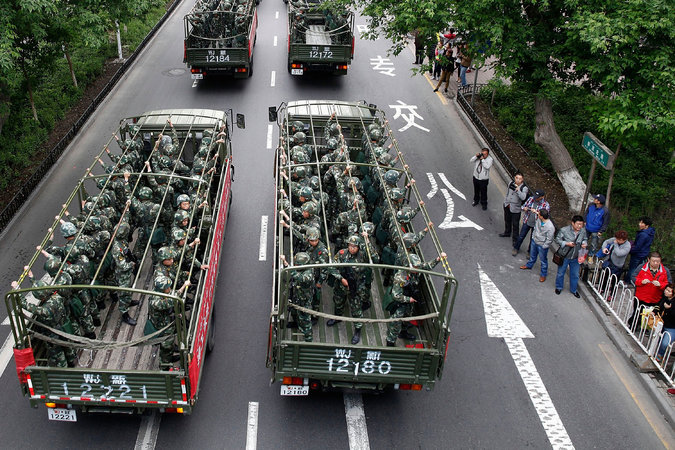 A show of police force in Xinjiang Province, China, where Uighurs complain of repression. Credit Color China Photo, via Associated Press