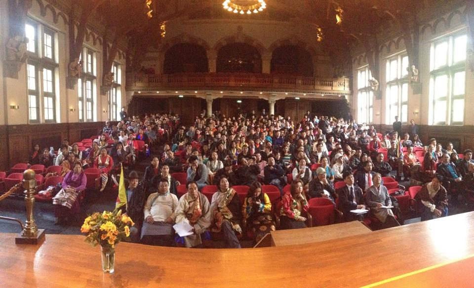 Tibetan community members listening to Sikyong's address in Amsterdam