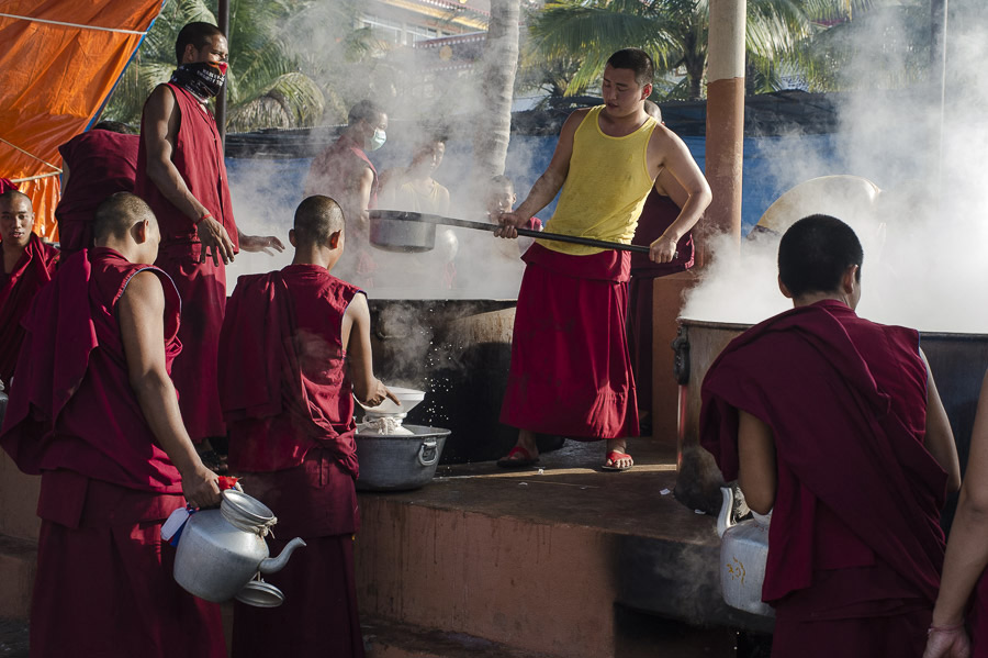 Monks preparing tea to serve to the over 25,000 people attending His Holiness the Dalai Lama's teaching at Ganden Jangtse Monastery in Mundgod, India on December 24, 2014. Photo/Tenzin Choejor/OHHDL