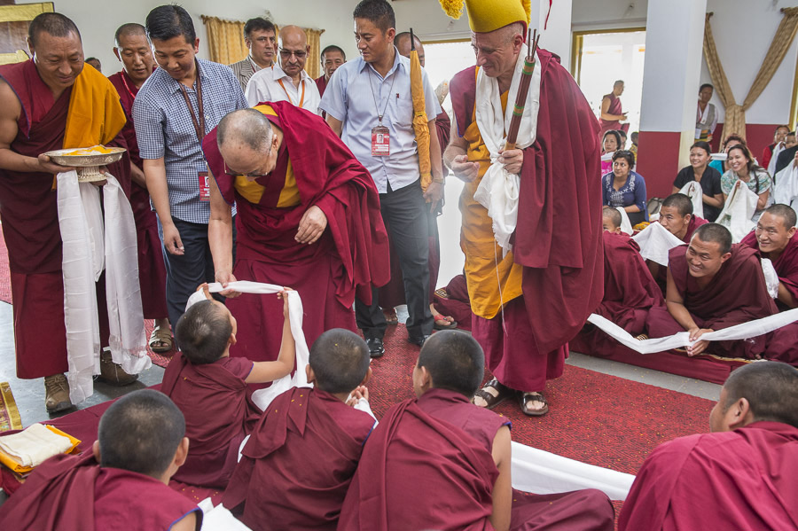 A young monk offering His Holiness the Dalai Lama a ceremonial scarf on his arrival at Rato Monastery in Mundgod, Karnataka, India on December 29, 2014. Photo/Tenzin Choejor/OHHDL