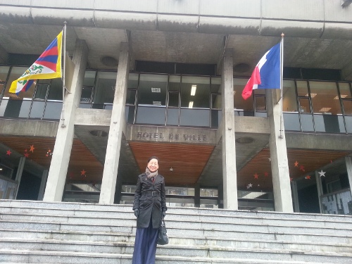 Kalon Dicki Chhoyang in front of the Grenoble city hall.