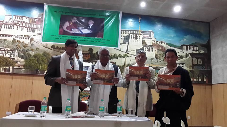 Mr. PGR Sindhia, former Home Minister of Karnataka state, Mr. Asif Iqbal, Honorary Consul of Republic of Suriname, Dr. Vevai, Medical Superintendent of MVJ Hospital and Chief Representative of the southern Tibetan settlements Mr. Karma Singe launching the book "Little Tibet" at the ceremony in Bangalore.