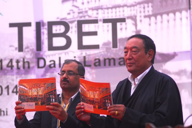 Kalon Pema Chhinjor of Department of Religion and Culture, and Mr. C.G Suprasanna, Joint resident commissioner of Karnataka Bhavan, inaugurating the book "Little Tibet" at the festival.