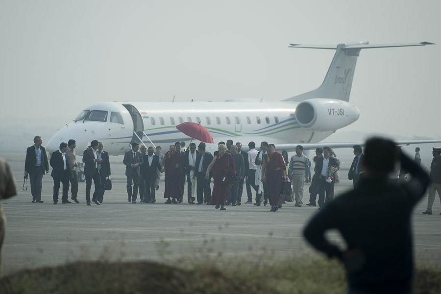 His Holiness the Dalai Lama arriving at the Surat airport at the start of his two day visit to Surat, Gujarat, India on January 1, 2015. Photo/Tenzin Choejor/OHHDL