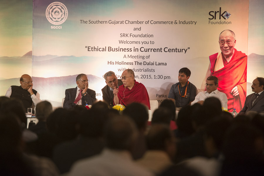 His Holiness the Dalai Lama responding to questions from the audience during his meeting with industrialists in Surat, Gujarat, India on January 2, 2015. Photo/Tenzin Choejor/OHHDL
