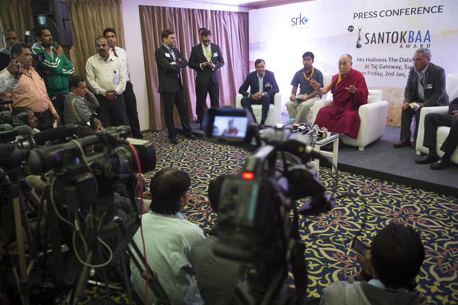 His Holiness the Dalai Lama speaking with members of the media in Surat, Gujarat, India on January 2, 2015. Photo/Tenzin Choejor/OHHDL