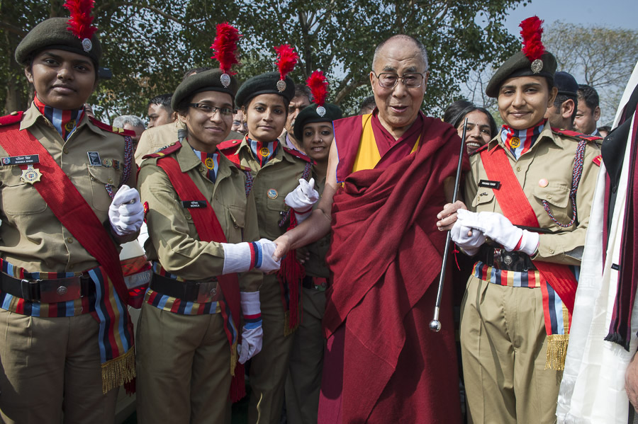 is Holiness the Dalai Lama poses for a photo with student members of National Cadet Corps after his talk at Kalindi College for Women in New Delhi, India on January 28, 2015. Photo/Tenzin Choejor/OHHDL