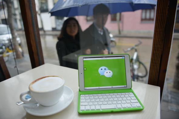 This photo illustration taken on March 12, 2014, shows the logo of Chinese instant messaging platform called WeChat, which has taken the country by storm in just three years.