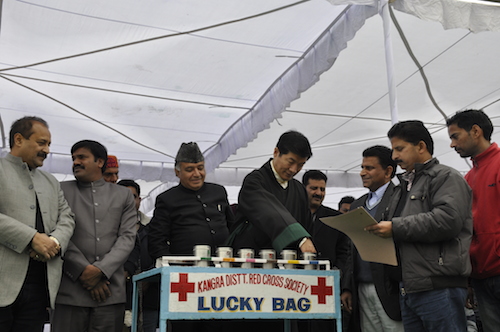 Sikyong Dr. Lobsang Sangay drawing the winning lottery ticket at Police Ground, lower Dharamshala, 26 January 2015.