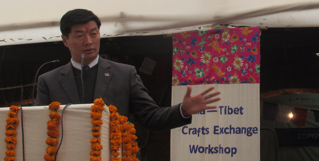 Sikyong Dr. Lobsang Sangay speaking to the crowd during the closing ceremony of the annual crafts festival.