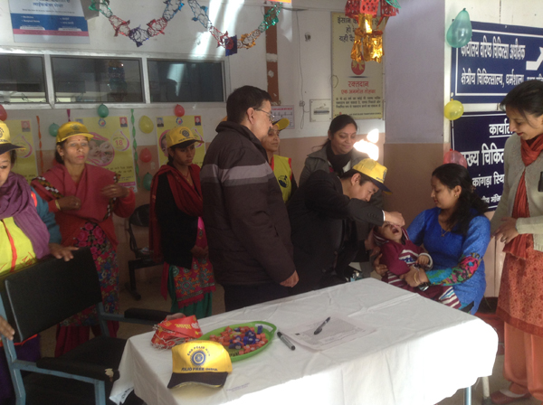 Health Kalon giving polio drops to a child at the launch of the IPPI campaign 2015 at Zonal Hospital, Dharamshala on 18 January 2015.