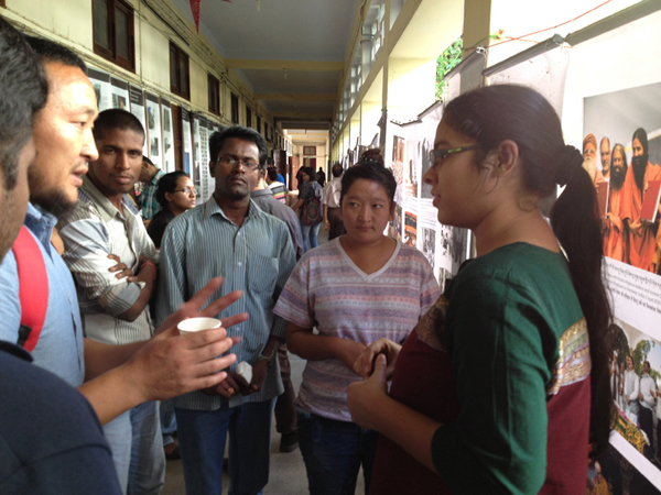 Tibetan students interacting with other students about the situation inside Tibet.