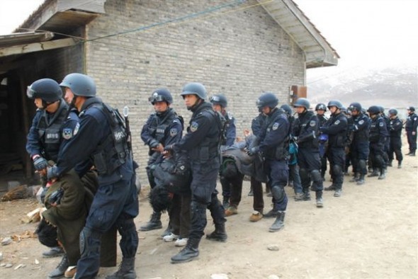 2011 file photo released by Boxun website shows lay Tibetans being forcibly taken away by Chinese police in a Tibetan area incorporated into China’s Sichuan Province