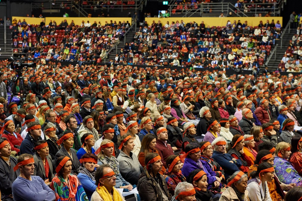 A view of the audience wearing ritual blindfolds is Holiness the Dalai Lama's conferring of the Avalokiteshvara Empowerment at St Jakobshalle in Basel, Switzerland on February 8, 2015. Photo/Olivier Adam