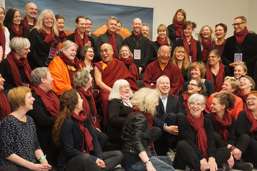 His Holiness the Dalai Lama with a group of volunteers that are helping during his visit to Copenhagen, Denmark on February 11, 2015. Photo/Jeremy Russell/OHHDL