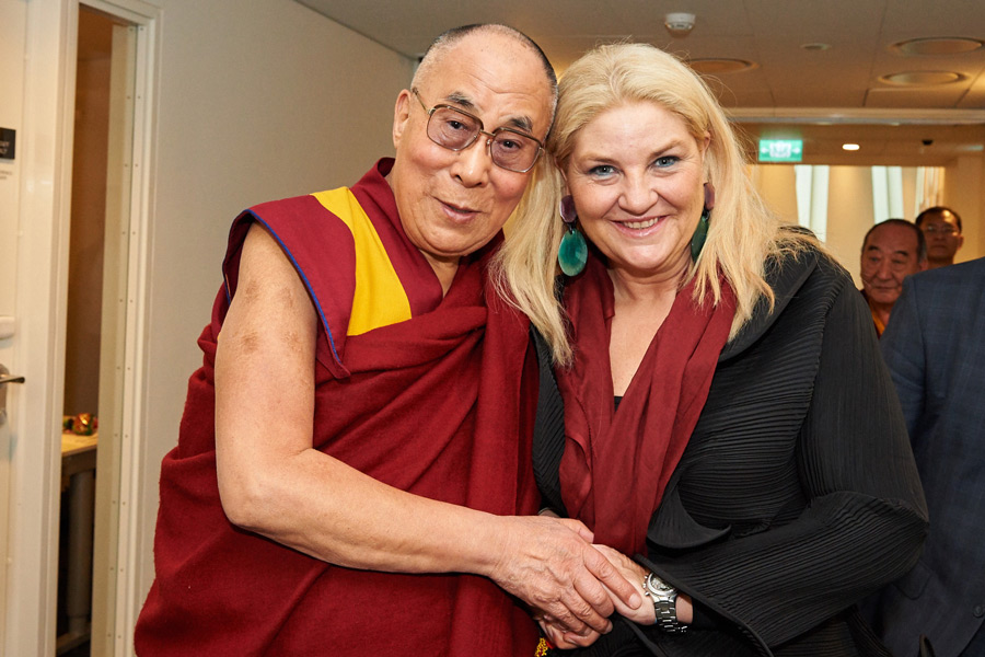 His Holiness the Dalai Lama with Birgitte Mørck Schultzer, Project leader for his visit to Copenhagen, Denmark on February 11, 2015. Photo/Olivier Adam