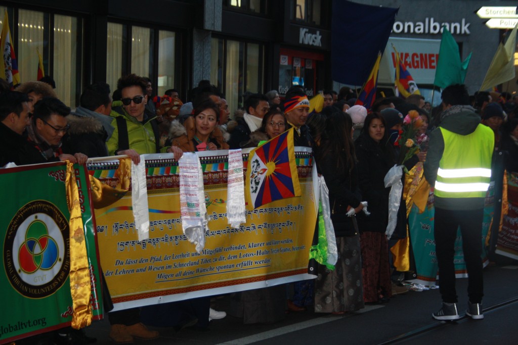 Tibetans with traditional scarves waiting for His Holiness the Dalai Lama, 6 February 2015.