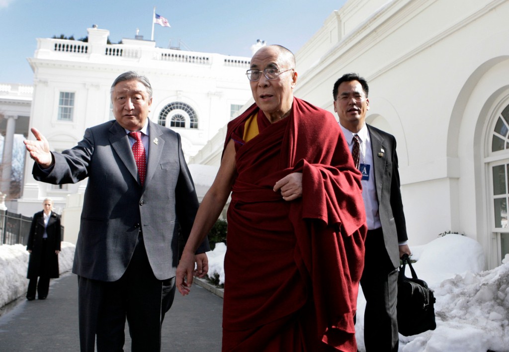 Tibetan spiritual leader the Dalai Lama walks outside the White House after his meeting with U.S. President Barack Obama in Washington on Feb. 18, 2010/Yuri Gripas—Reuters