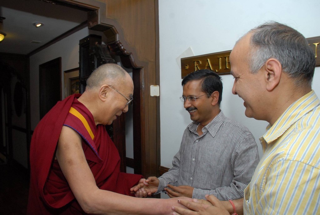 His Holiness the Dalai Lama with the two AAP leaders.