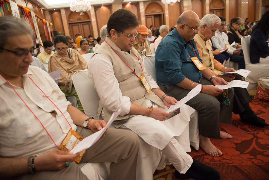 Members of the audience reciting a Long Life Prayer for His Holiness the Dalai Lama at the conclusion of his teaching in New Delhi, India on March 21, 2015. Photo/Tenzin Choejor/OHHDL