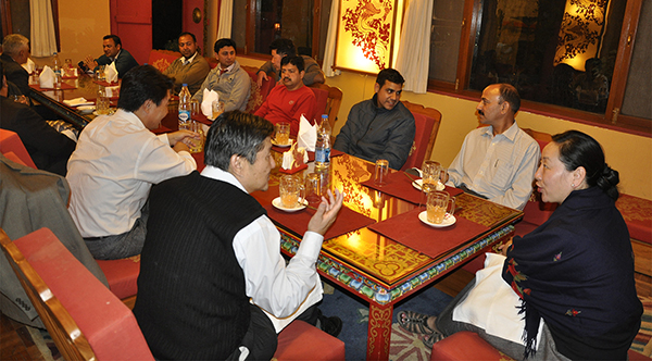 Secretary Sonam Norbu Dagpo gestures as he speaks to Kalon Dicki Chhoyang, 23 March 2015.