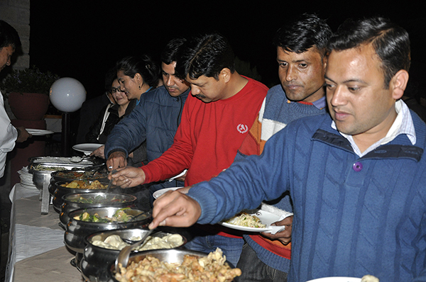 Members of the Indian press relishing the dishes at the annual dinner reception, 23 March 2015.