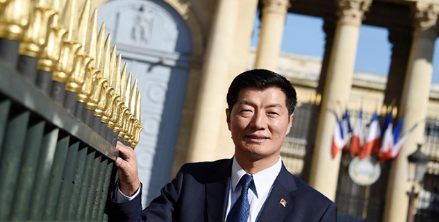 Lobsang Sangay, Sikyong (prime minister) of the Tibetan Government-in-Exile, poses in front of the French National Assembly on March 12, 2015 in Paris (AFP Photo/Dominique Faget)
