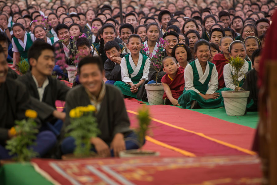 Students listening to His Holiness the Dalai Lama speaking during his visit with Archbishop Desmond Tutu to Tibetan Children's Village School (TCV) in Upper Dharamsala, HP, India on April 23, 2015. Photo/Tenzin Choejor/OHHDL