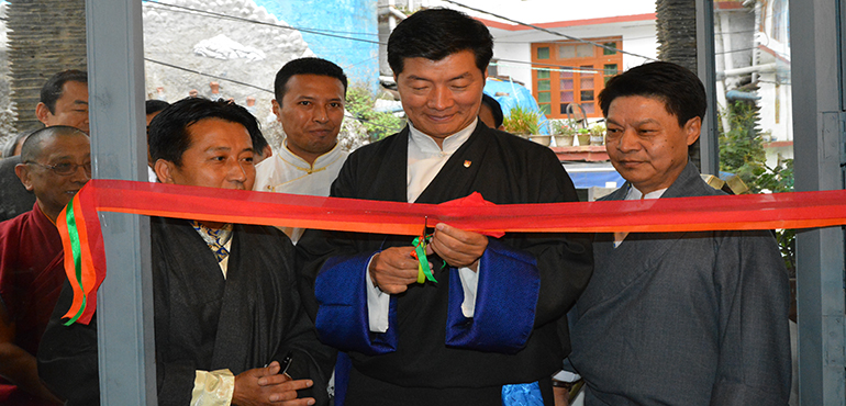 Sikyong Dr. Lobsang Sangay accompanied by DIIR Secretary Tashi Phuntsok and Director of Tibet Museum, cutting the ribbon to inaugurate the new re-designed building of Tibet Museum, 30 April 2015.