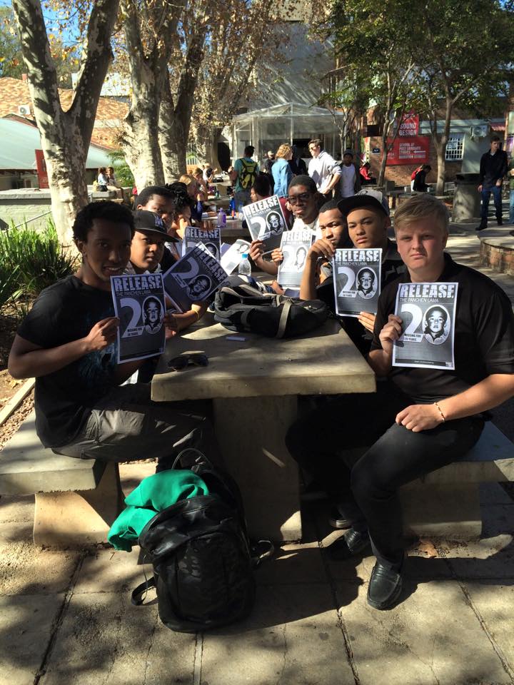 Students from the African Film and Drama Academy expressing their support for the release of 11th Panchen Lama.