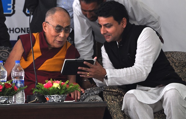 Shri. SUdhir Sharma showing the app to His Holiness the Dalai Lama, 09 May 2015.