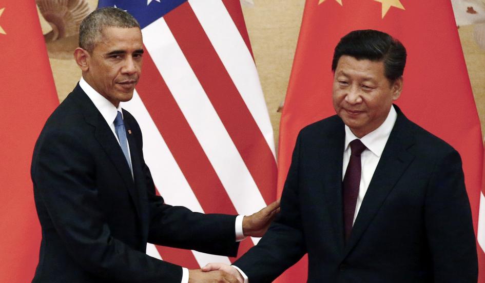 U.S. President Barack Obama shakes hands with China's President Xi Jinping during a joint news conference at the Great Hall of the People in Beijing November 12, 2014. Petar Kujundzic/Reuters