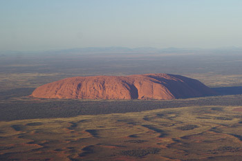 A view of the Uluru rock formation from the plane as His Holiness the Dalai Lama travels from Ulru in the Northern Territory to Perth, WA, Australia on June 14, 2015. Photo/Jeremy Russell/OHHDL