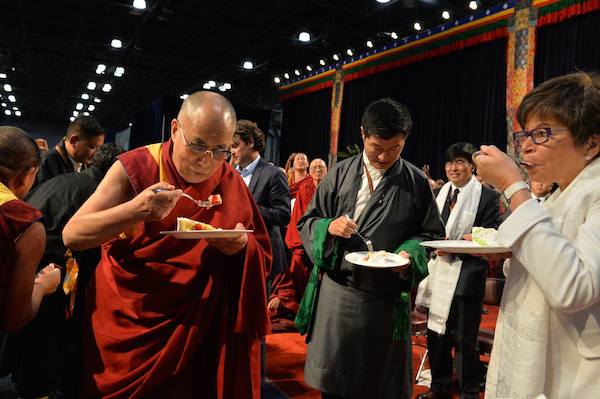 His Holiness the Dalai Lama, Sikyong Dr.Lobsang Sangay and Ms. Valerie Jarett at NATA's long life prayer offering and event to celebrate His Holiness the Dalai Lama's 80th birthday at Javits Centre in New York, 11 July.