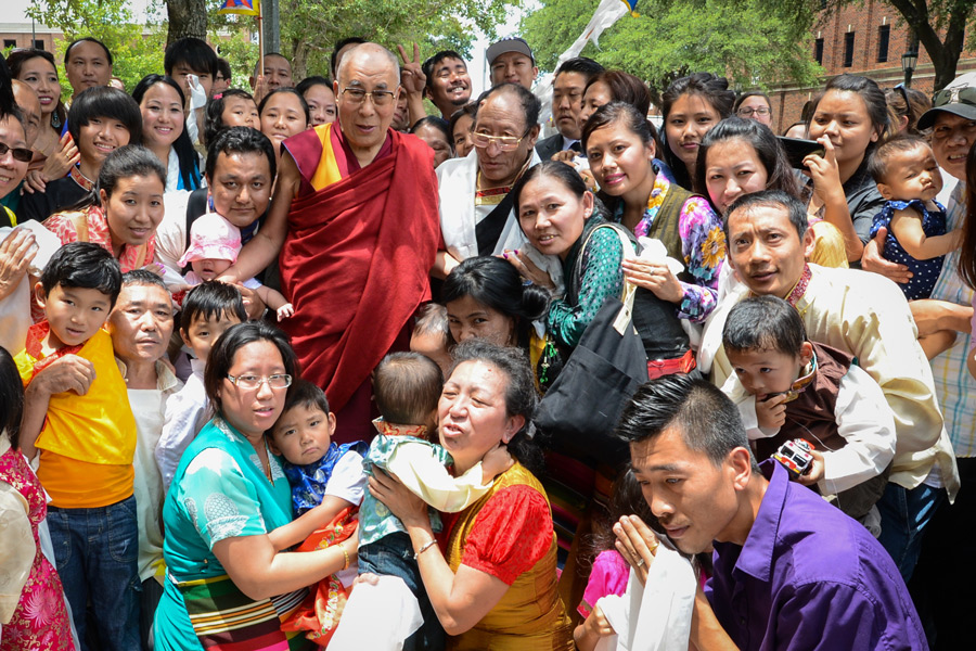 His Holiness the Dalai Lama with members of the Tibetan community who came to welcome him to Dallas, Texas, USA on July 1, 2015. Photo/Bush Center