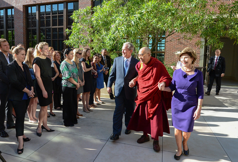Staff at the Bush Center sing Happy Birthday to His Holiness the Dalai Lama as walk to lunch in Dallas, Texas, USA on July 1, 2015. Photo/Bush Center
