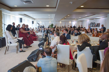 His Holiness the Dalai Lama addressing the audience at a special breakfast to celebrate his 80th birthday at the Honda Center in Anaheim, California, USA on July 5, 2015. Photo/Tenzin Choejor/OHHDL