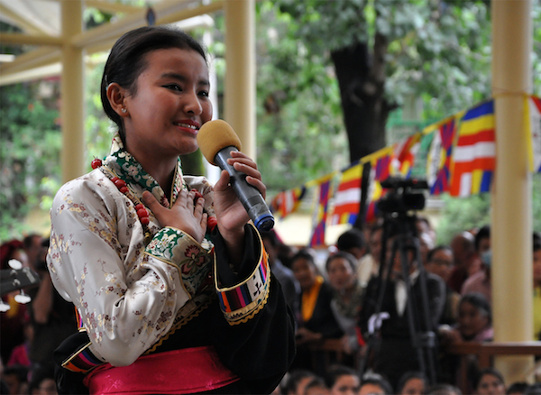 A young girl from Lower TCV school singing a song at the celebration, 6 July 2015.