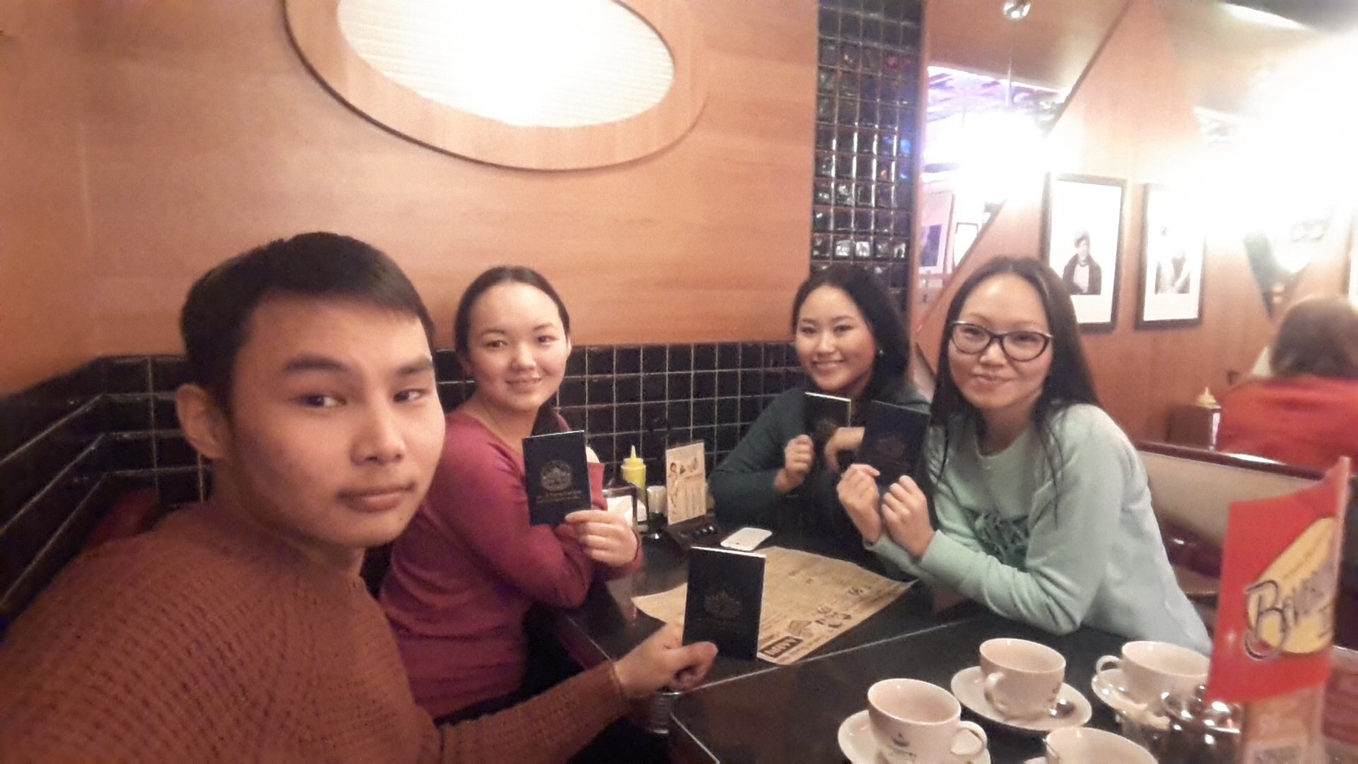 Tibet supporters with their blue book for Tibet.