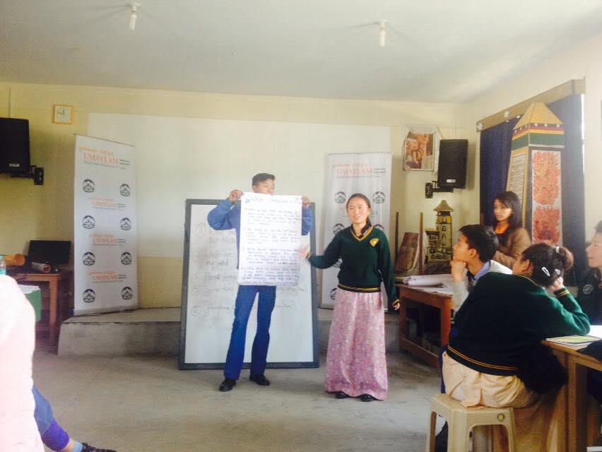 A participant presenting ideas during the workshop.