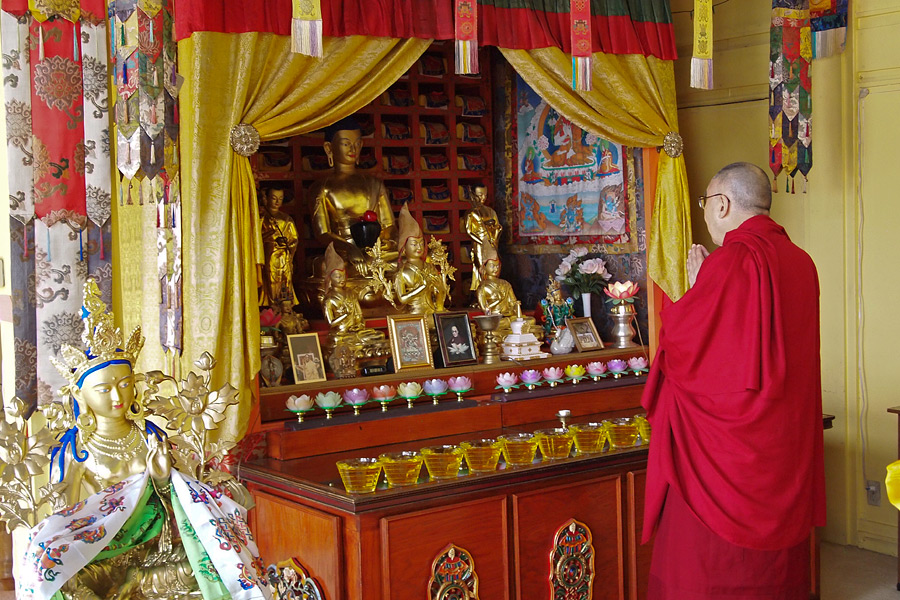 His Holiness the Dalai Lama paying respects before the images in the Kalachakra Temple at Deer Park Buddhist Center in Madison, WI, USA on March 6, 2016. Photo/Jeremy Russell/OHHDL