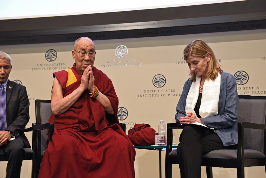 His Holiness the Dalai Lama leading a silent prayer for victims and survivors of the Orlando shooting at the start of his conversation with United States Institute of Peace youth leaders in Washington DC, USA on June 13, 2016. Photo/USIP