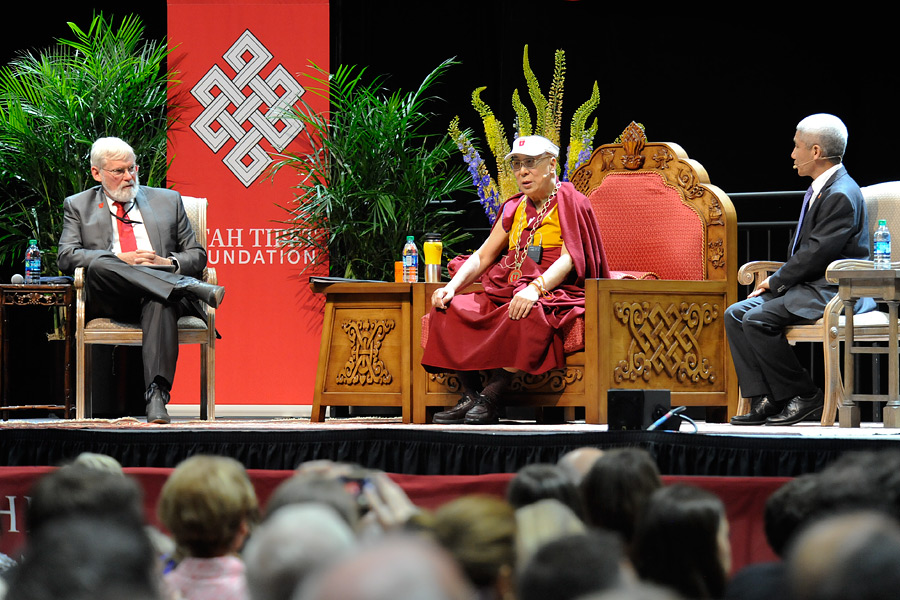 His Holiness the Dalai Lama answering questions from the audience posed by University of Utah's President David Pershing during his public talk in Salt Lake City, Utah on June 21, 2016. Photo/Thom Gourley