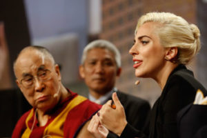 His Holiness the Dalai Lama looks on as Lady Gaga adds her comments during their interactive discussion at the US Conference of Mayors in Indianapolis, IN, USA on June 26, 2016. Photo/Chris Bergin